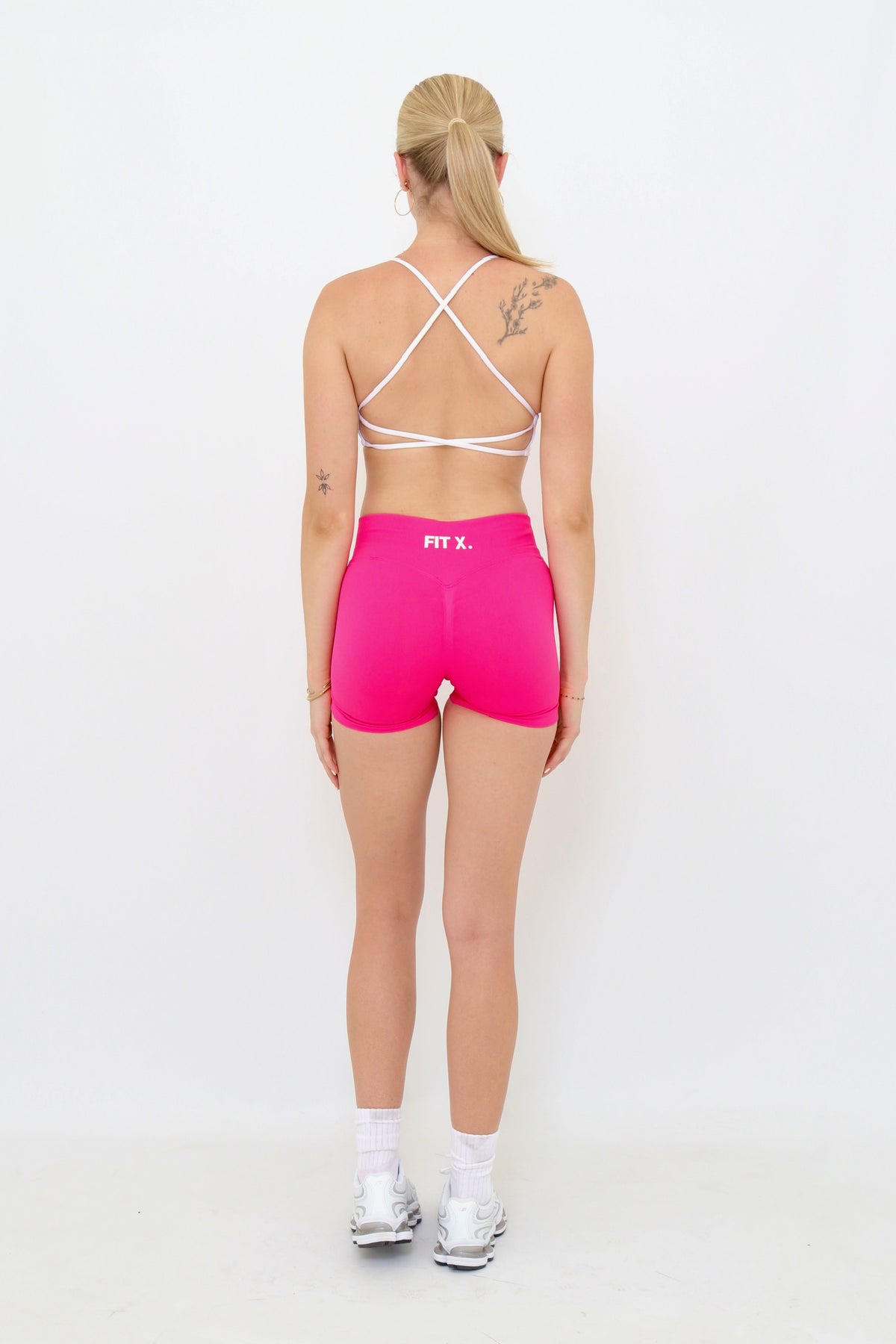 White cross strap sports bra